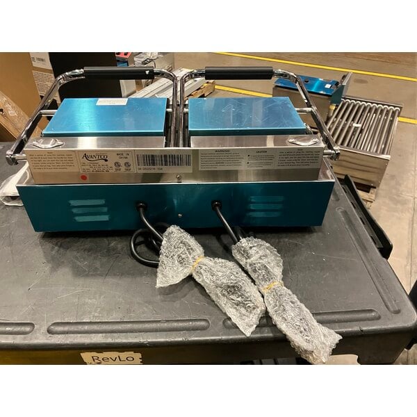 Scratch and Dent Avantco PG400GST Commercial Dual Panini Sandwich Grill with Timer, Grooved Top and Smooth Bottom Plates, and 19 5/8" x 9 1/8" Cooking Surface - 120V, 3500W
