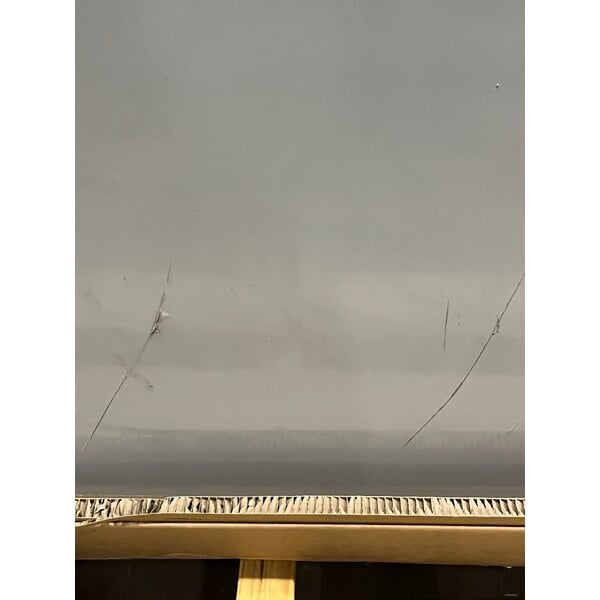 Scratch and Dent Regency C-2472-316 24" x 72" 16 Gauge Type 304 Stainless Steel Enclosed Base Table with Sliding Doors and Adjustable Midshelf