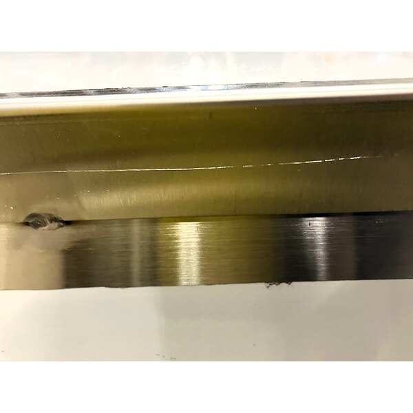 Scratch and Dent Regency C-2472-316 24" x 72" 16 Gauge Type 304 Stainless Steel Enclosed Base Table with Sliding Doors and Adjustable Midshelf