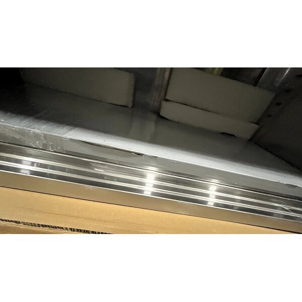 Scratch and Dent Regency C-2472-316 24" x 72" 16 Gauge Type 304 Stainless Steel Enclosed Base Table with Sliding Doors and Adjustable Midshelf