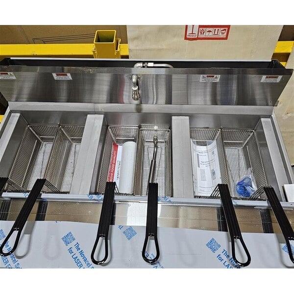 Scratch and Dent Henny Penny OFG-323 3-Well Natural Gas Fryer with Computron 1000 Controls - 255,000 BTU