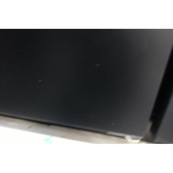 Scratch and Dent Avantco UBB-72-HC 73" Black Counter Height Narrow Solid Door Back Bar Refrigerator with LED Lighting
