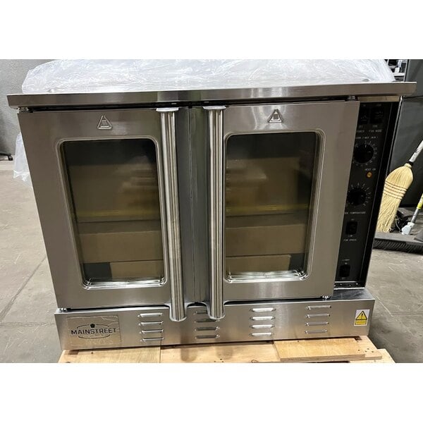 Scratch and Dent MainStreet Equipment CG1-N Single Deck Full Size Natural Gas Convection Oven with Legs - 54,000 BTU