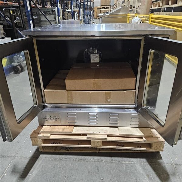 Scratch and Dent MainStreet Equipment CG1-N Single Deck Full Size Natural Gas Convection Oven with Legs - 54,000 BTU