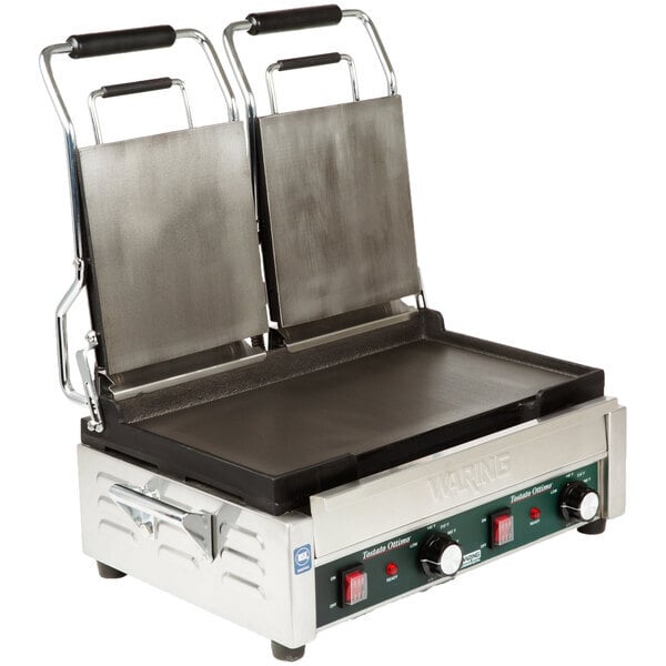 Scratch and Dent Waring WFG300 Tostato Ottimo Smooth Top & Bottom Dual Panini Sandwich Grill - 17" x 9 1/4" Cooking Surface - 240V, 3120W