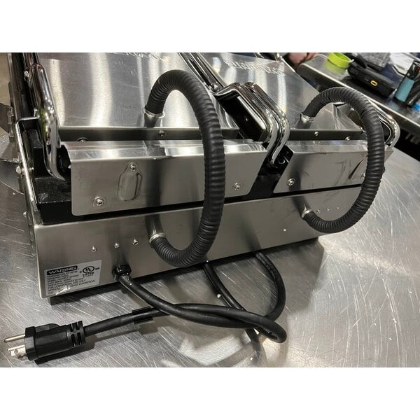 Scratch and Dent Waring WFG300 Tostato Ottimo Smooth Top & Bottom Dual Panini Sandwich Grill - 17" x 9 1/4" Cooking Surface - 240V, 3120W