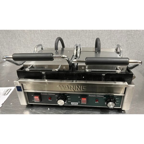 Scratch and Dent Waring WFG300 Tostato Ottimo Smooth Top & Bottom Dual Panini Sandwich Grill - 17" x 9 1/4" Cooking Surface - 240V, 3120W