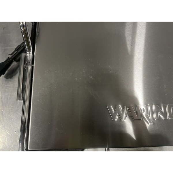 Scratch and Dent Waring WFG250 Tostato Supremo Large Smooth Top & Bottom Panini Grill - 14 1/2" x 11" Cooking Surface - 120V, 1800W