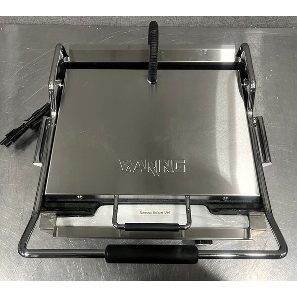 Scratch and Dent Waring WFG250 Tostato Supremo Large Smooth Top & Bottom Panini Grill - 14 1/2" x 11" Cooking Surface - 120V, 1800W