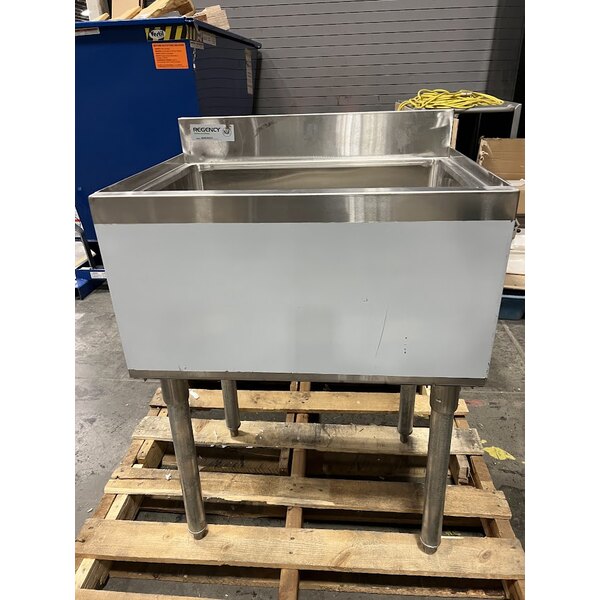Scratch and Dent Regency 18" x 24" Underbar Ice Bin with 7 Circuit Post-Mix Cold Plate, Bottle Holders, and Sliding Lid - 51 lb.
