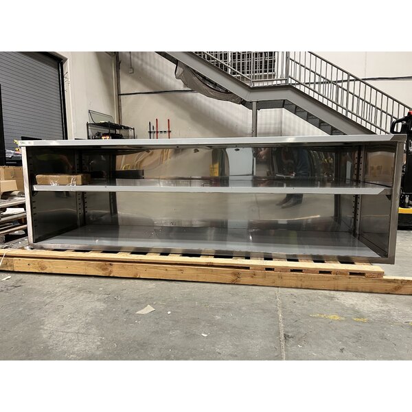 Scratch and Dent Regency 24" x 96" 16 Gauge Type 304 Stainless Steel Enclosed Base Table with Sliding Doors and Adjustable Midshelf