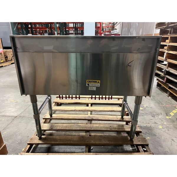 Scratch and Dent Regency 18" x 36" Underbar Ice Bin with 7 Circuit Post-Mix Cold Plate and Bottle Holders - 79 lb.