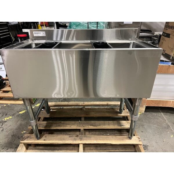 Scratch and Dent Regency 18" x 36" Underbar Ice Bin with 7 Circuit Post-Mix Cold Plate and Bottle Holders - 79 lb.