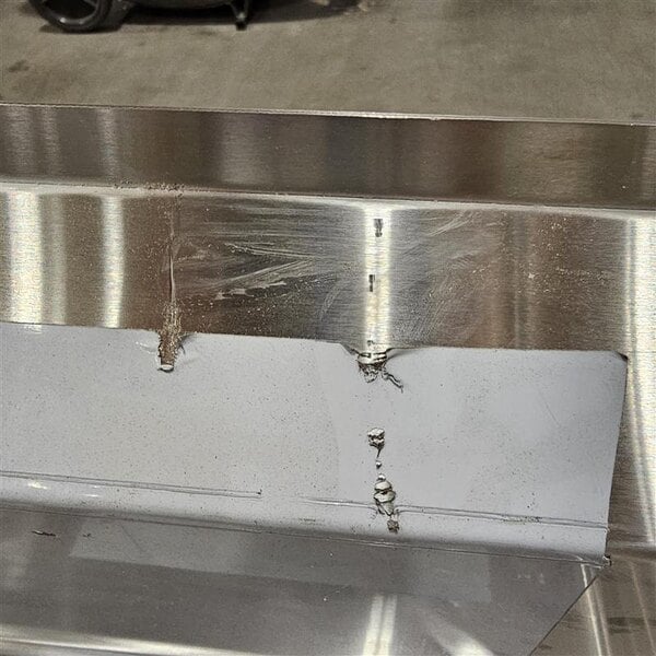 Scratch and Dent Regency 79" 16-Gauge Stainless Steel Three Compartment Commercial Sink with Stainless Steel Legs, Cross Bracing, and 2 Drainboards - 15" x 15" x 12" Bowls