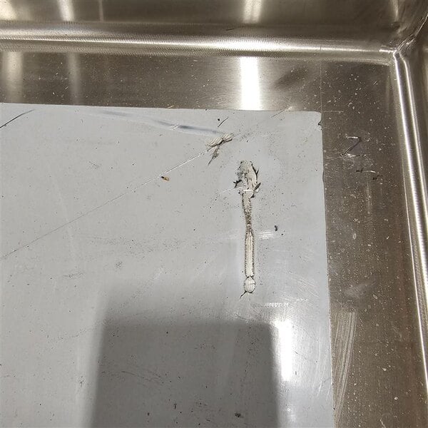 Scratch and Dent Regency 79" 16-Gauge Stainless Steel Three Compartment Commercial Sink with Stainless Steel Legs, Cross Bracing, and 2 Drainboards - 15" x 15" x 12" Bowls