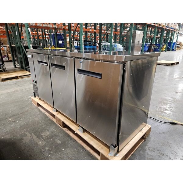 Scratch and Dent Avantco UBB-378-HC-S 79" Stainless Steel Counter Height Solid Door Back Bar Refrigerator with LED Lighting