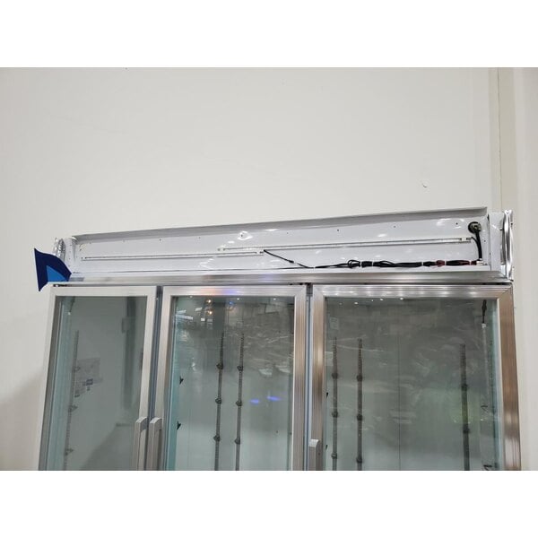 Scratch and Dent Avantco GDC-69-HC 78 1/4" White Customizable Swing Glass Door Merchandiser Refrigerator with LED Lighting