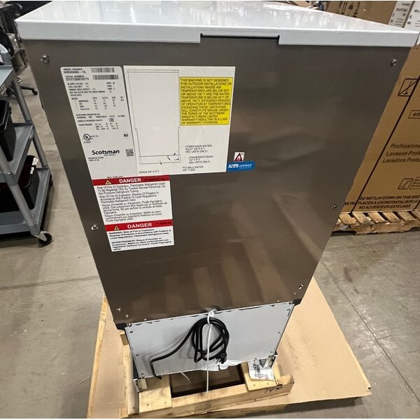 Scratch and Dent Scotsman HID540ABX-1A Meridian® Air-Cooled Countertop Nugget Ice Machine and Water Dispenser with Push Button Dispensing - 40 lb. Bin Capacity