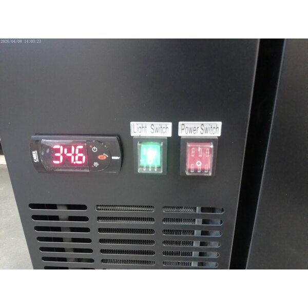 Scratch and Dent Avantco UBB-48-HC 48" Black Counter Height Narrow Solid Door Back Bar Refrigerator with LED Lighting