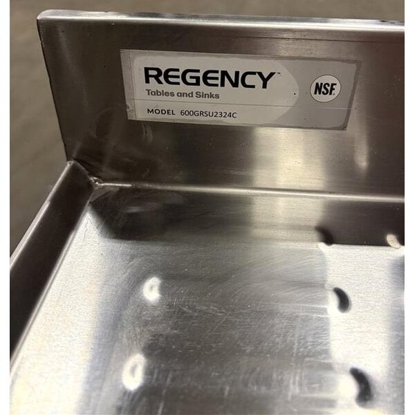 Scratch and Dent Regency Stainless Steel Corrugated Top Glass Rack Storage Unit - 23" x 24"