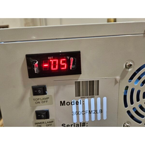 Scratch and Dent Avantco CFM2LB White Customizable Countertop Freezer with Swing Door and Top Lit Header