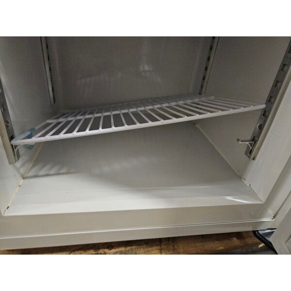 Scratch and Dent Avantco CFM2LB White Customizable Countertop Freezer with Swing Door and Top Lit Header
