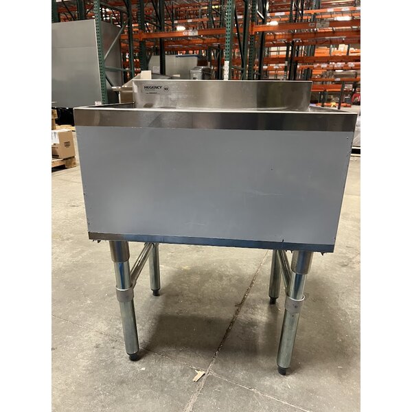 Scratch and Dent Regency 18" x 24" Underbar Ice Bin with 7 Circuit Post-Mix Cold Plate, Bottle Holders, and Sliding Lid - 51 lb.