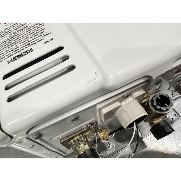 Scratch and Dent Rinnai V53DeP Liquid Propane Wall-Mounted Outdoor Tankless Water Heater - 120V, 120,000 BTU, 5.3 GPM