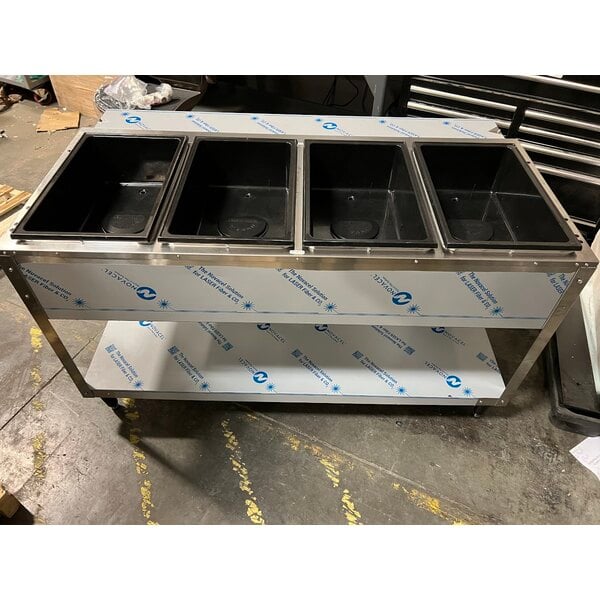 Scratch and Dent Vollrath 38104 ServeWell® Electric Four Pan Sealed Well Hot Food Table - 120V