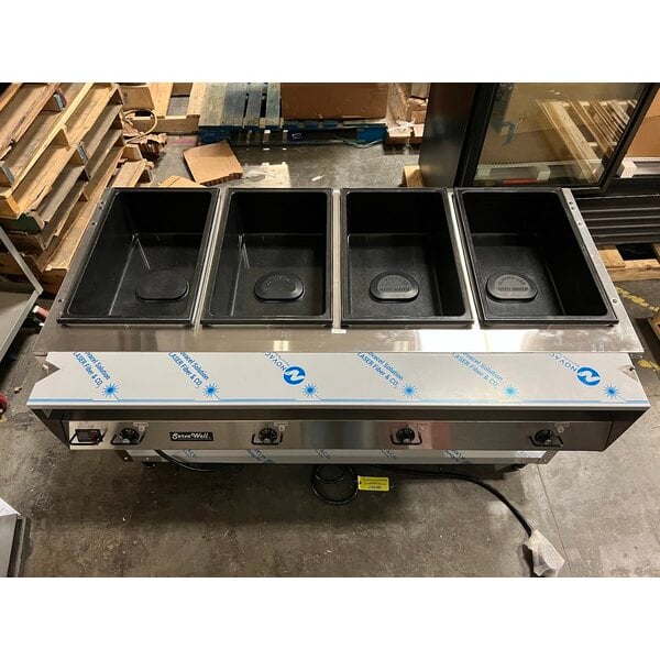 Scratch and Dent Vollrath 38104 ServeWell® Electric Four Pan Sealed Well Hot Food Table - 120V
