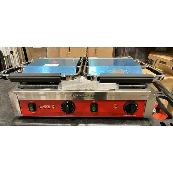Scratch and Dent Avantco PG400GS Commercial Dual Panini Sandwich Grill with Grooved Top and Smooth Bottom Plates, and 19 5/8" x 9 1/8" Cooking Surface - 120V, 3500W
