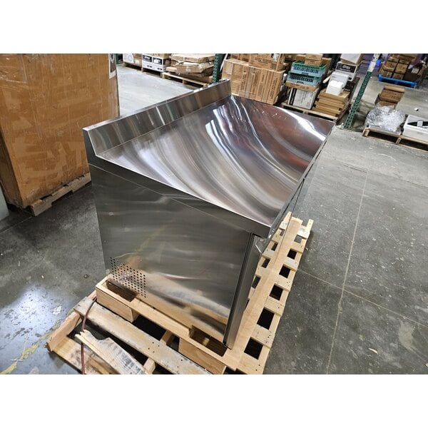 Scratch and Dent Avantco SS-WT-48F-HC Two Door Stainless Steel ADA Height Worktop Freezer with 3 1/2" Backsplash