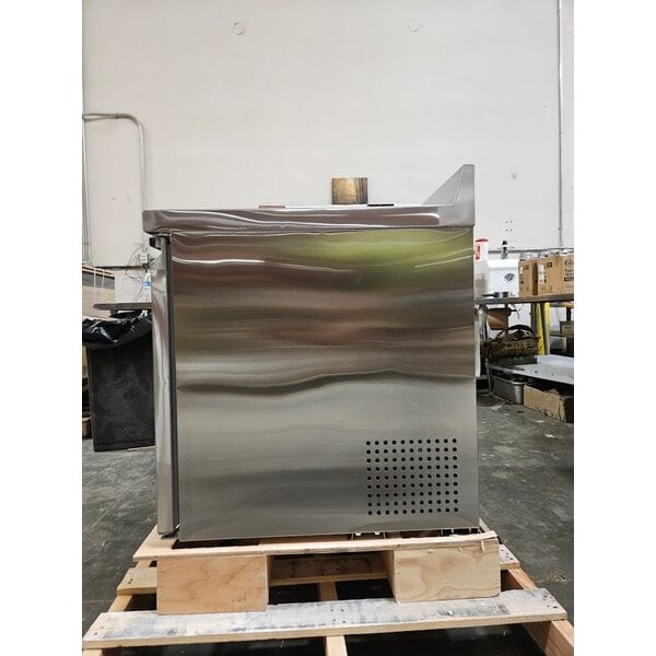 Scratch and Dent Avantco SS-WT-48F-HC Two Door Stainless Steel ADA Height Worktop Freezer with 3 1/2" Backsplash