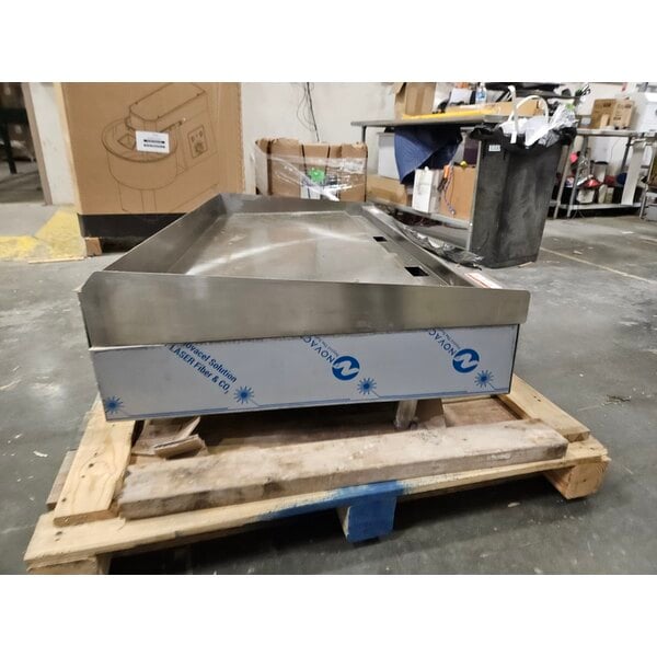 Scratch and Dent Wolf by Vulcan AGM60-LP Liquid Propane 60" Heavy-Duty Gas Countertop Griddle with Manual Controls - 135,000 BTU