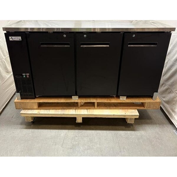 Scratch and Dent Avantco UBB-72-HC 73" Black Counter Height Narrow Solid Door Back Bar Refrigerator with LED Lighting