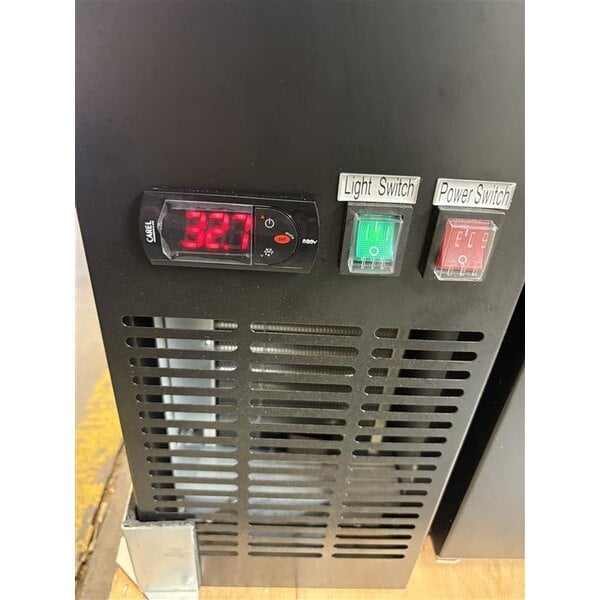 Scratch and Dent Avantco UBB-72-HC 73" Black Counter Height Narrow Solid Door Back Bar Refrigerator with LED Lighting