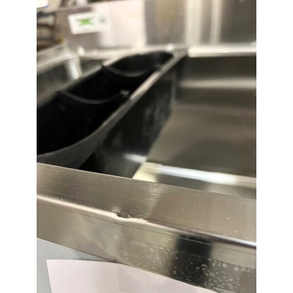 Scratch and Dent Regency 18" x 36" Stainless Steel Underbar Ice Bin with Bottle Holders - 119 lb.