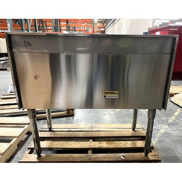Scratch and Dent Regency 18" x 36" Stainless Steel Underbar Ice Bin with Bottle Holders - 119 lb.