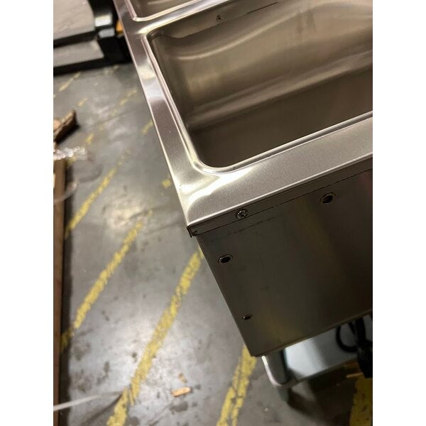 Scratch and Dent ServIt EST-4WS Four Pan Sealed Well Electric Steam Table with Adjustable Undershelf - 120V, 2000W
