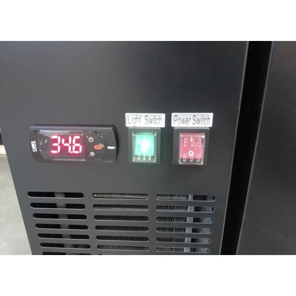 Scratch and Dent Avantco UBB-36-HC 36" Black Counter Height Solid Door Back Bar Refrigerator with LED Lighting