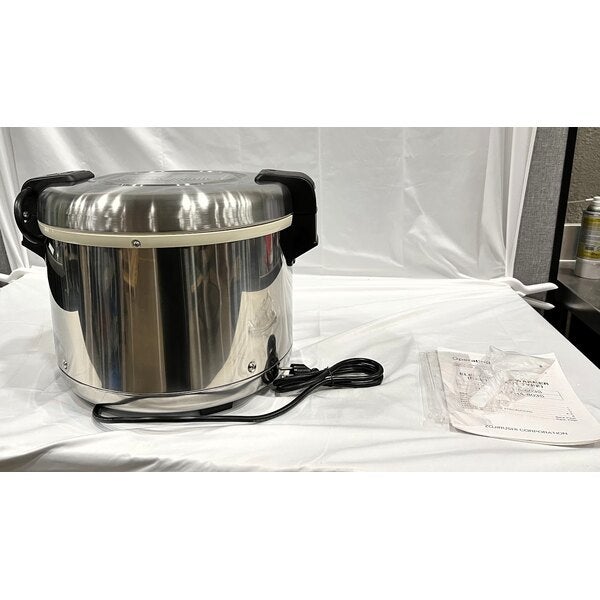 Scratch and Dent Zojirushi THA-603SA 66 Cup (Cooked) Stainless Steel Electric Rice Warmer with Removable Pot - 120V, 77W