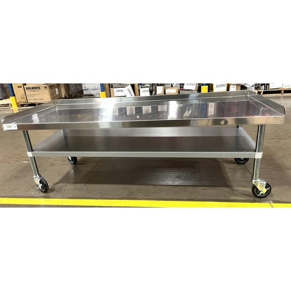Scratch and Dent Regency 30" x 72" 16 Gauge Stainless Steel Equipment Stand with Galvanized Undershelf and Casters