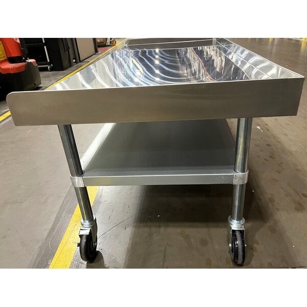 Scratch and Dent Regency 30" x 72" 16 Gauge Stainless Steel Equipment Stand with Galvanized Undershelf and Casters