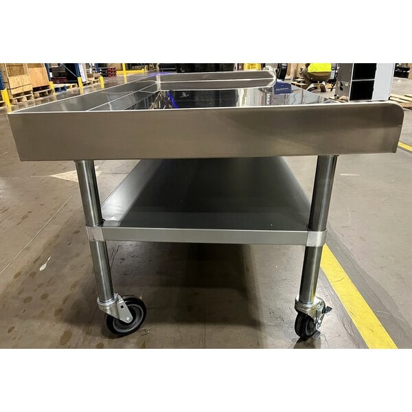 Scratch and Dent Regency 30" x 72" 16 Gauge Stainless Steel Equipment Stand with Galvanized Undershelf and Casters