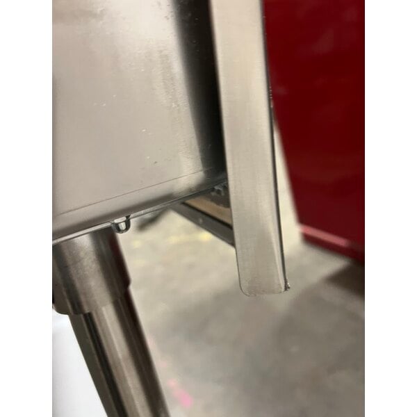 Scratch and Dent Regency Spec Line 30" x 60" 14 Gauge Stainless Steel Commercial Work Table with 4" Backsplash and Undershelf
