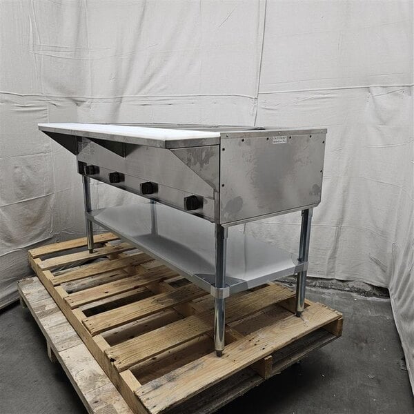 Scratch and Dent ServIt GST-4WE-LP Four Pan Open Well Liquid Propane Steam Table with Undershelf - 14,000 BTU