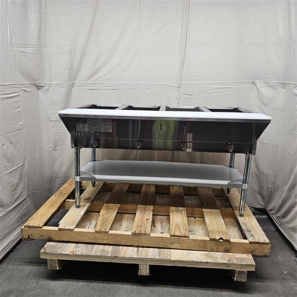 Scratch and Dent ServIt GST-4WE-LP Four Pan Open Well Liquid Propane Steam Table with Undershelf - 14,000 BTU