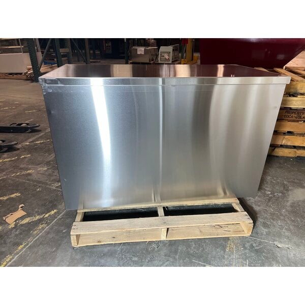 Scratch and Dent Regency 24" x 48" 16 Gauge Type 304 Stainless Steel Enclosed Base Table with Sliding Doors and Adjustable Midshelf