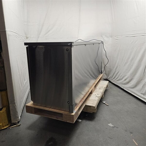 Scratch and Dent Avantco UDD-4-HC-S Stainless Steel Kegerator / Beer Dispenser with (2) 2 Tap Towers - (3) 1/2 Keg Capacity