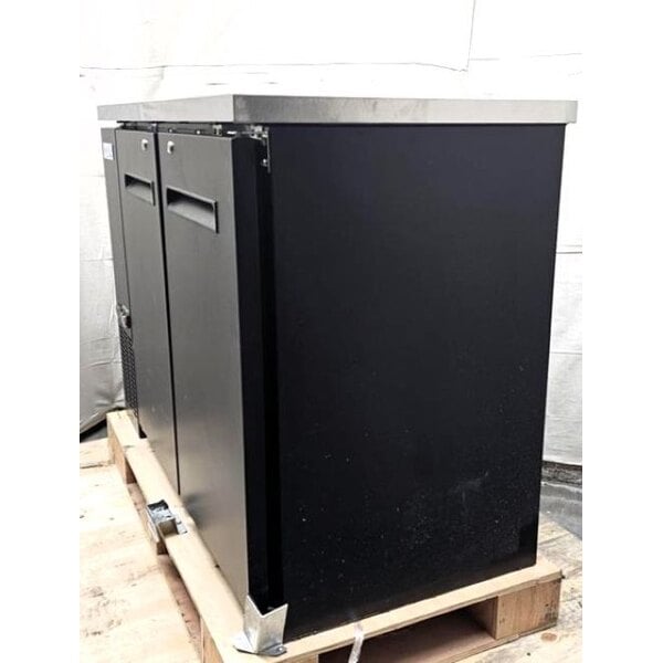 Scratch and Dent Avantco UBB-48-HC 48" Black Counter Height Narrow Solid Door Back Bar Refrigerator with LED Lighting